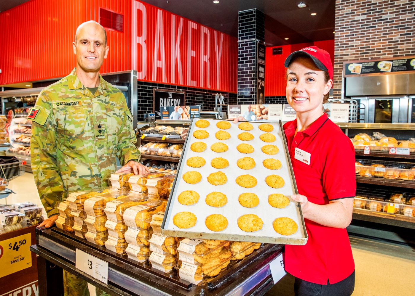 Chairman of Bravery Trust Lieutenant Colonel Garth Callender with Coles Pacific Fair Team Member Andie